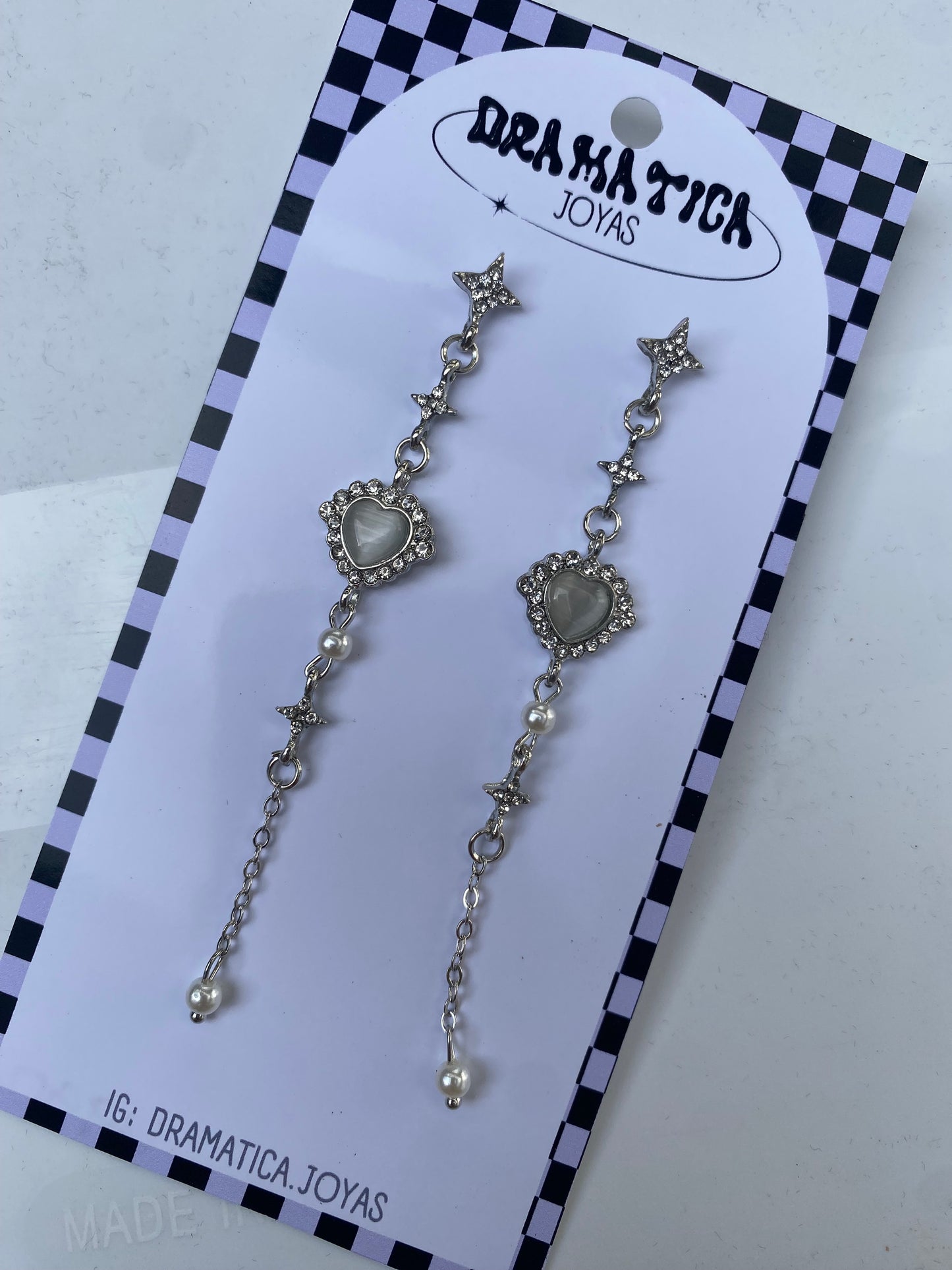 Aros largos corazón blanco