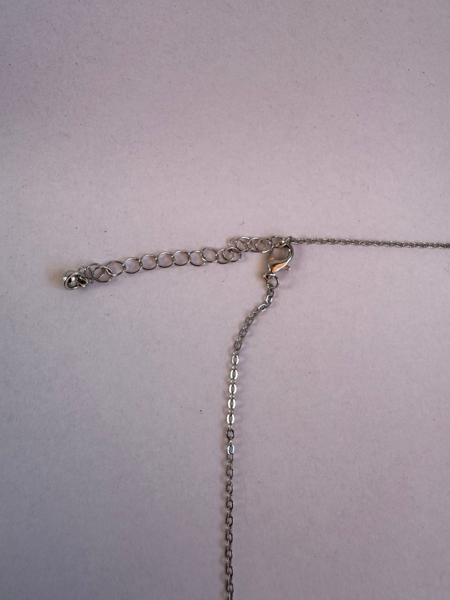 COLLAR ESTRELLA GRIS