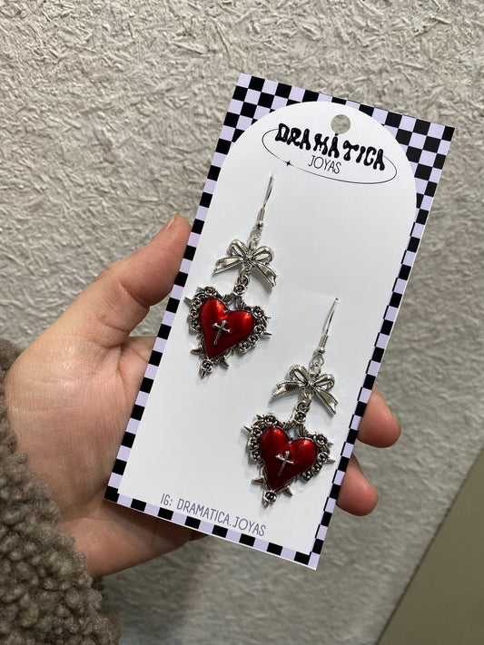 aros corazon/cruz