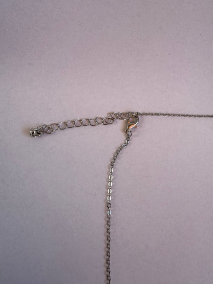 COLLAR ESTRELLA GRIS